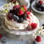 Berry Blossom Pavlova – A light, airy delight bursting with fresh berries!